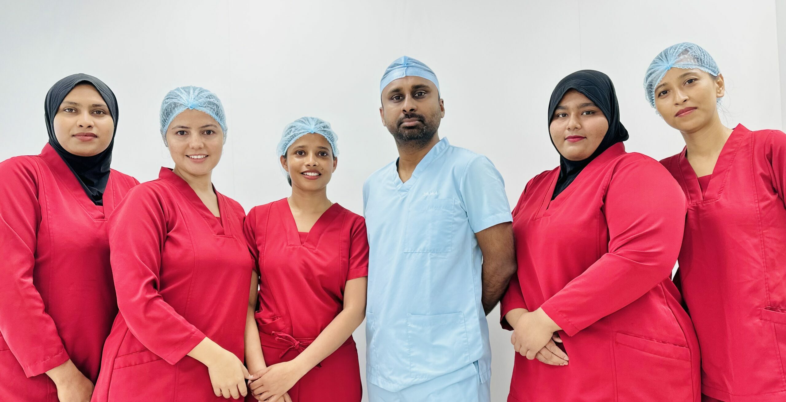 Dr Azzam with his team after completing the cataract and retinal detachment surgery